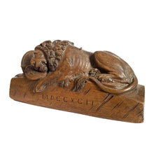 Wooden carved statue of the dying lion of Lucerne