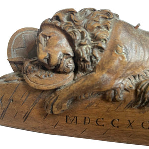 Wooden carved statue of the dying lion of Lucerne