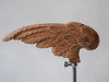 Antique wood carved wing on vintage stand