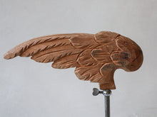 Antique wood carved wing on vintage stand
