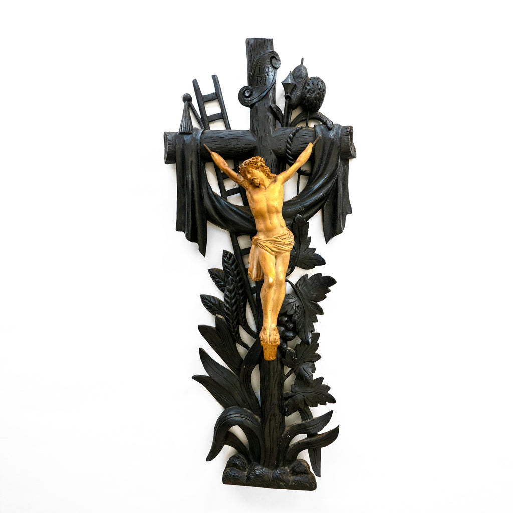 Jezus aan een houten kruis.
