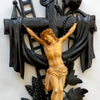 Jezus aan een houten kruis.