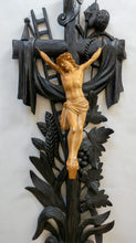 Jesus on wooden carved cross